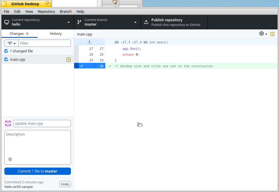 GitHub Desktop: A local repository in GitHub Desktop, with a one-line change ready to commit through the system Git.