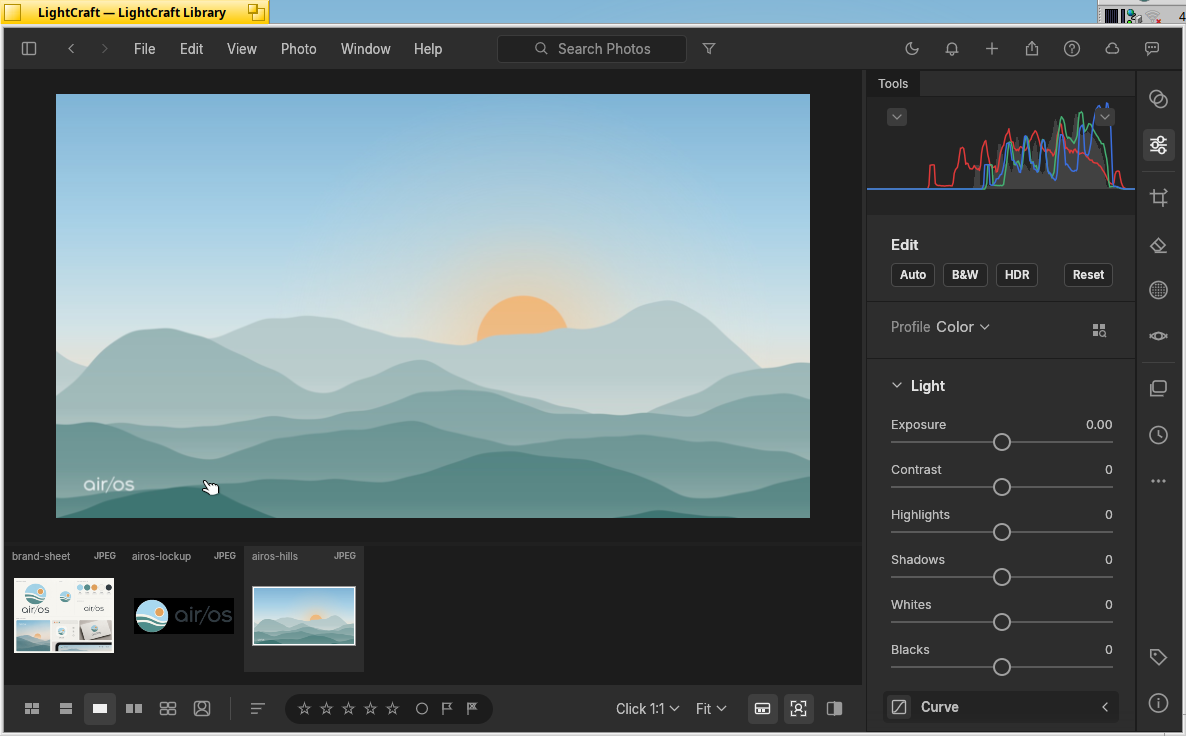LightCraft: LightCraft's develop view with a filmstrip of airOS artwork, the histogram and light controls.